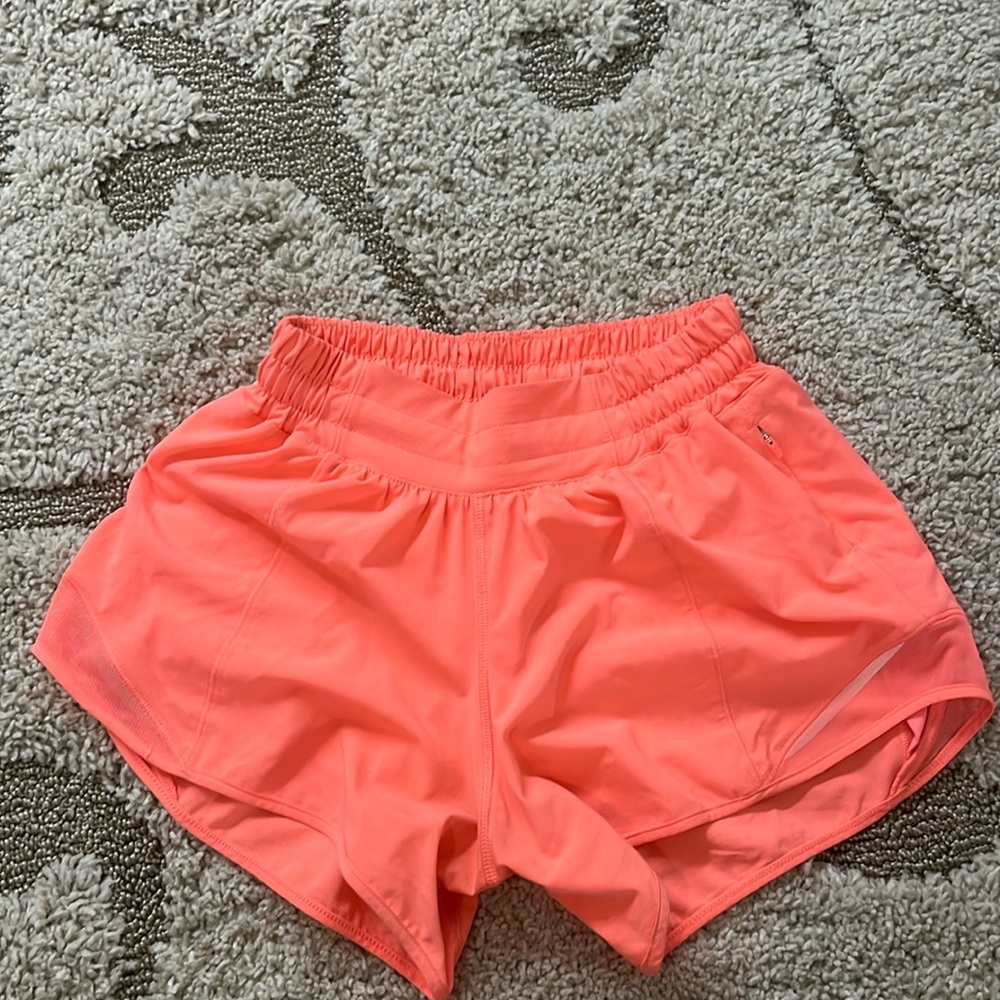 Lululemon sunset orange size 2 low rise 4inch hotty hots